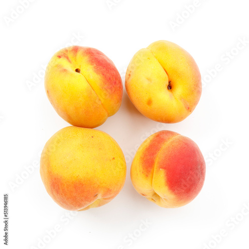 Juicy vitamin apricots on a white background, sweet fruits.