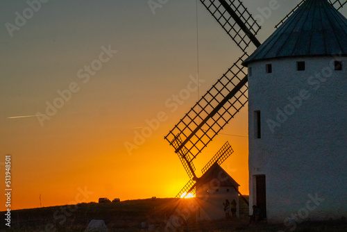 Sunset at the windmills of Campo de Criptana, Spain photo