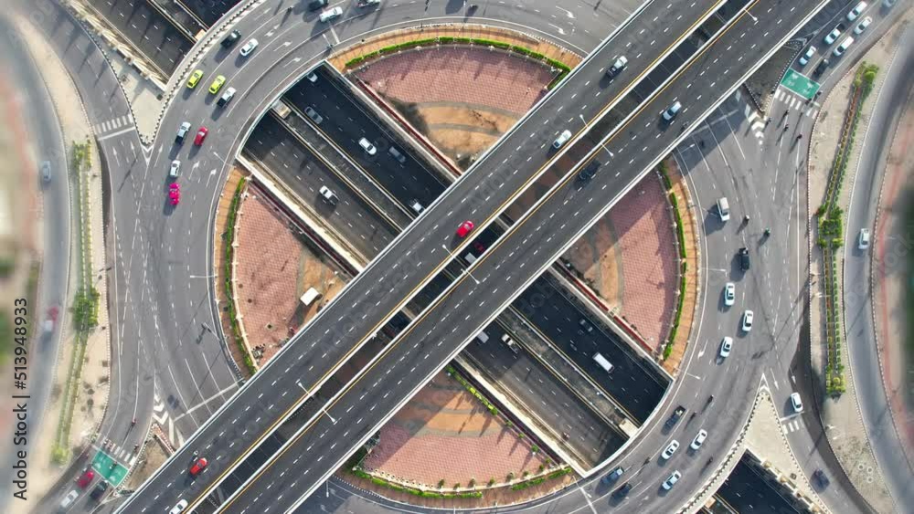 4K : Aerial view shot of fast moving above Tunnel under the interchange roundabout. multi junction road. traffic of cars. infrastructure in thailand. traffic in Nonthaburi thailand
4K : Aerial view shot of fast moving above Tunnel under the interchange roundabout. multi junction road. traffic of cars. infrastructure in thailand. traffic in Nonthaburi thailand