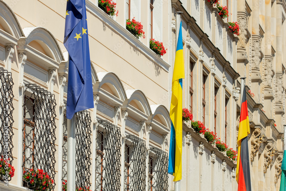 EU, Germany and Ukraine flags on house