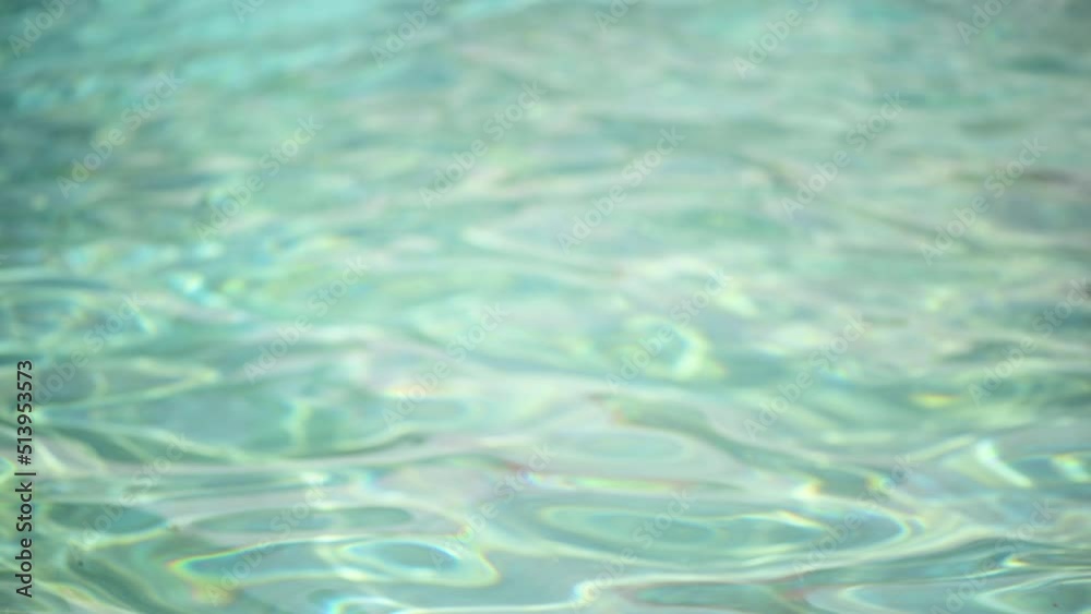 Rippled clean swimming pool water as background Rippled clean swimming pool water as background