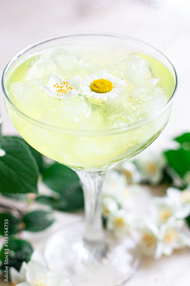 Refreshing chamomile drink. Very narrow focus, the center of the drink in focus. Refreshing chamomile drink. Very narrow focus, the center of the drink in focus.