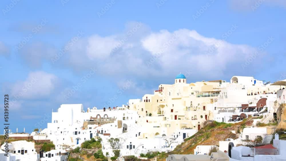 Travel trip in Santorini Island , Greece. as Picture square view of traditional Cycladic Santorini houses with blue sky background Travel trip in Santorini Island , Greece. as Picture square view of traditional Cycladic Santorini houses with blue sky background