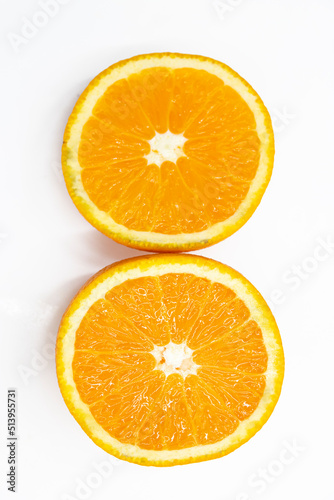 orange fruit slices isolated on white background.top view