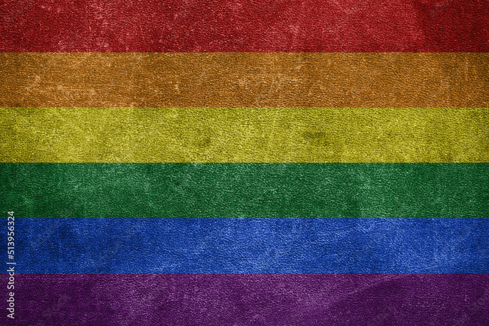 Old leather shabby background in colors of LGBT flag
