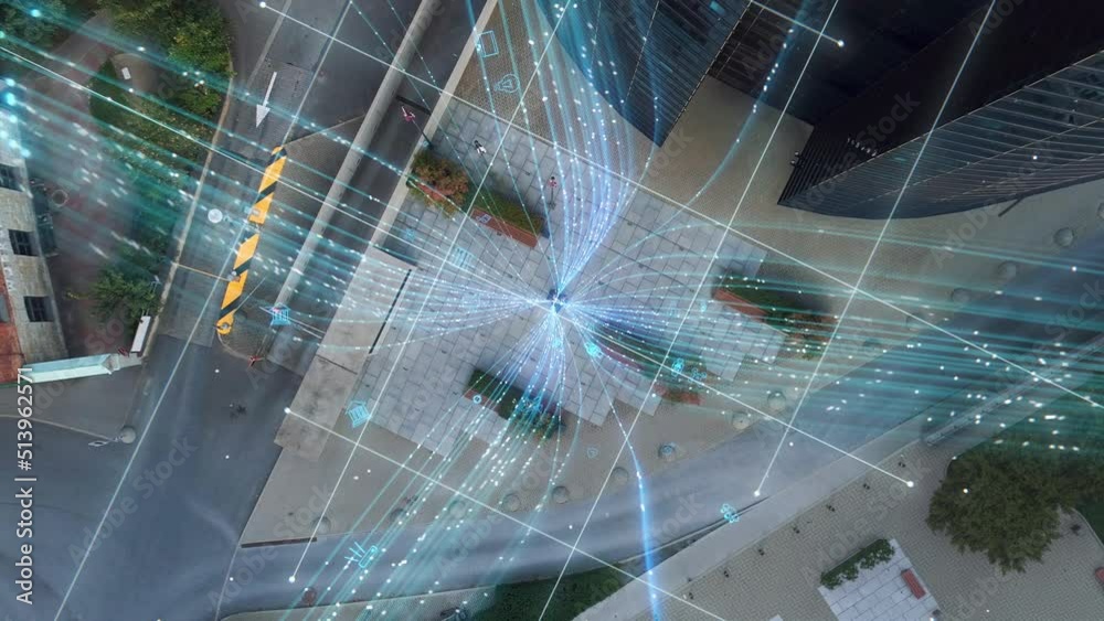 Big City Business Partners Use Laptop Computer in Urban Park. E-Commerce Visualization of Information Lines Flying from Laptop into Global Internet Network. Top-Down Zoom Out Aerial Drone Shot.