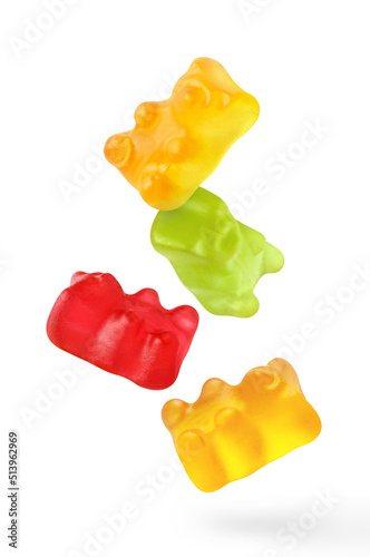 Flying delicious jelly gummy bears, isolated on white background