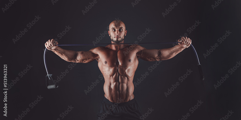 Obraz premium Muscular man exercising doing sit up exercise. Athlete with six pack, white male, no shirt