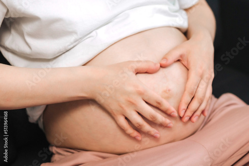 Wallpaper Mural Close up healthy Stomach woman hands made heart Torontodigital.ca
