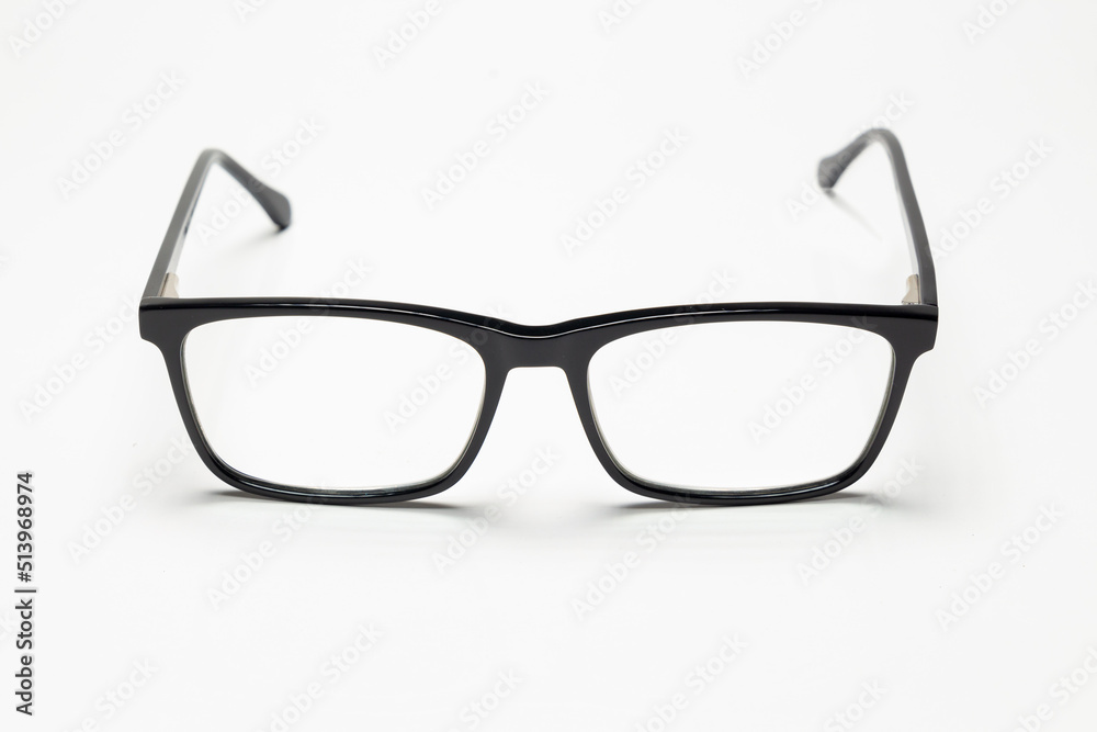 Carbon fiber degree glasses in black color. Front view and white background. Space for text. Carbon fiber degree glasses in black color. Front view and white background. Space for text.