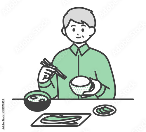 食事をする高齢男性のイラスト素材