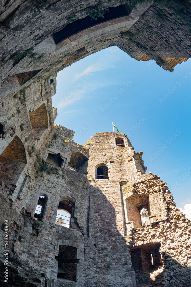 A shot looking upwards into the remains of Raglan castle. This medieval structure is now a popular tourist attraction in South Wales UK