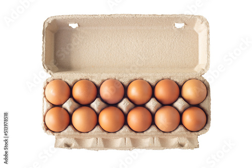 Top view of fresh chicken eggs in paper box package isolated on white background included clipping path.