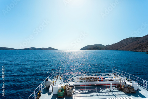 The ferry sails on the sea. Journey through the islands of Greece