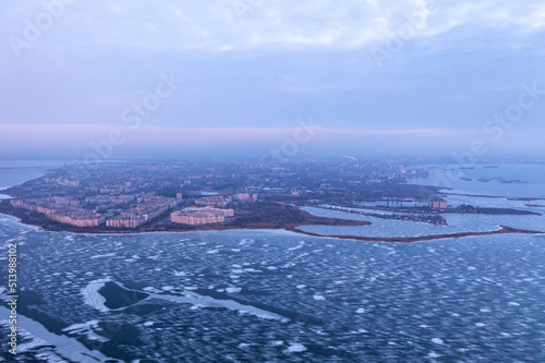 Historical fortification in the field. The remains of the defense system of the city of Nikolaev. Flight over the winter river photo