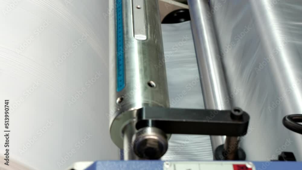 Close-up of rotating film rolls.