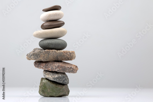 Photography pyramid of stacked stones on a light background