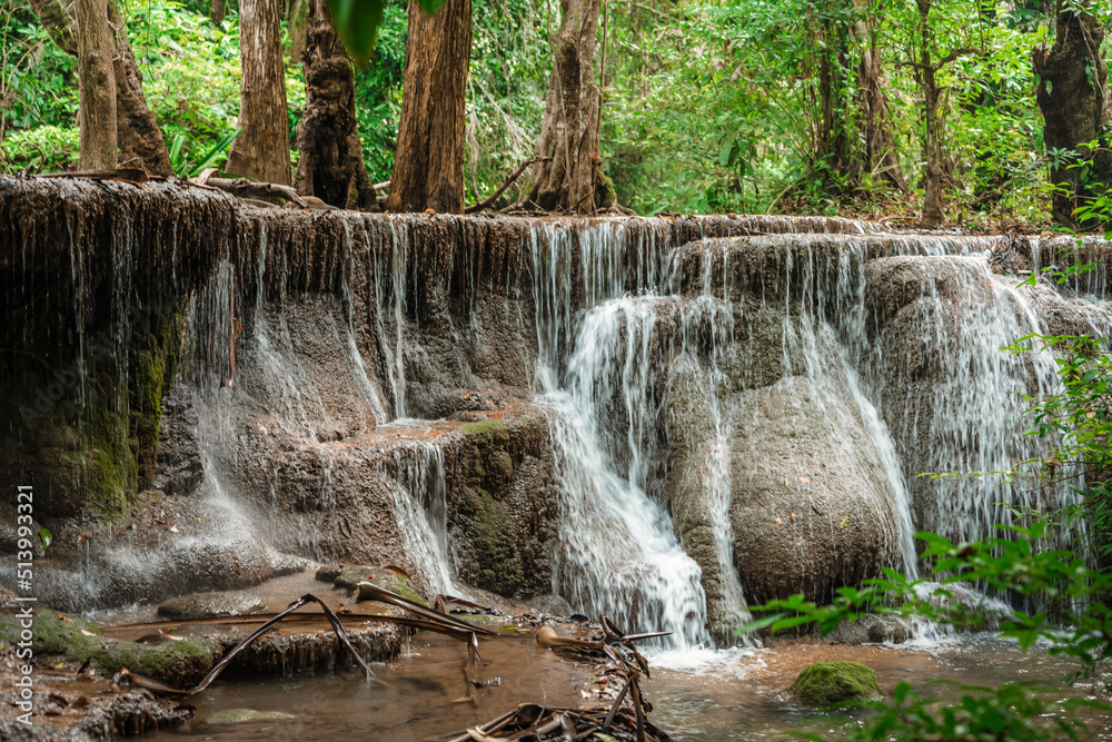 Obraz premium beautiful emerald waterfalls green forest mountains guiding for backpacker Thailand destinations backpacking camping relaxing hiking at Huai Mae Khamin waterfall national park, Kanchanaburi.