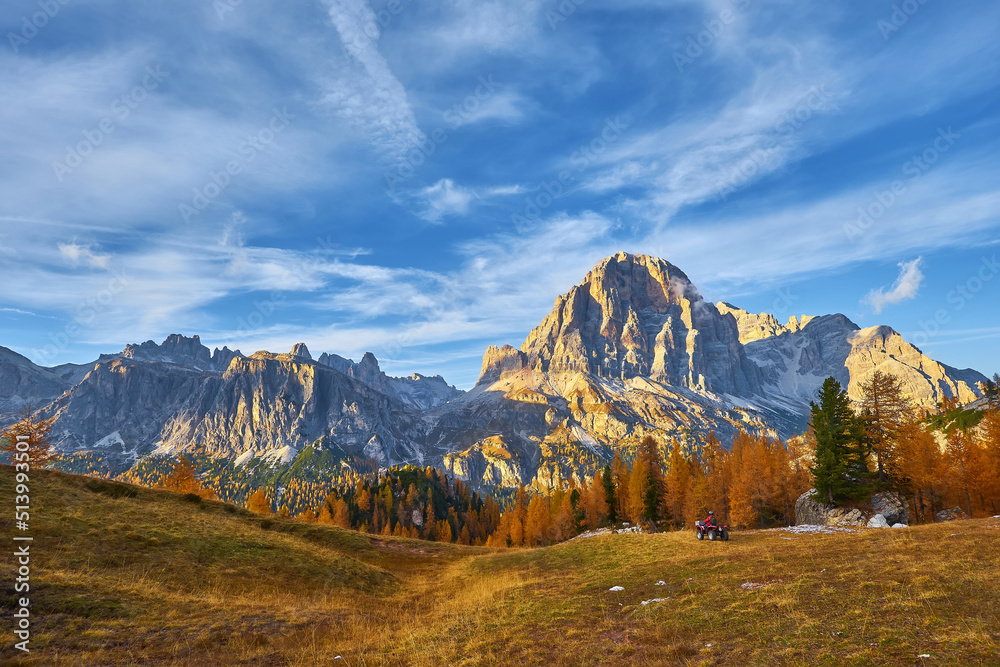 View of Tofane mountains seen from Falzarego pass in an autumn landscape in Dolomites, Italy.