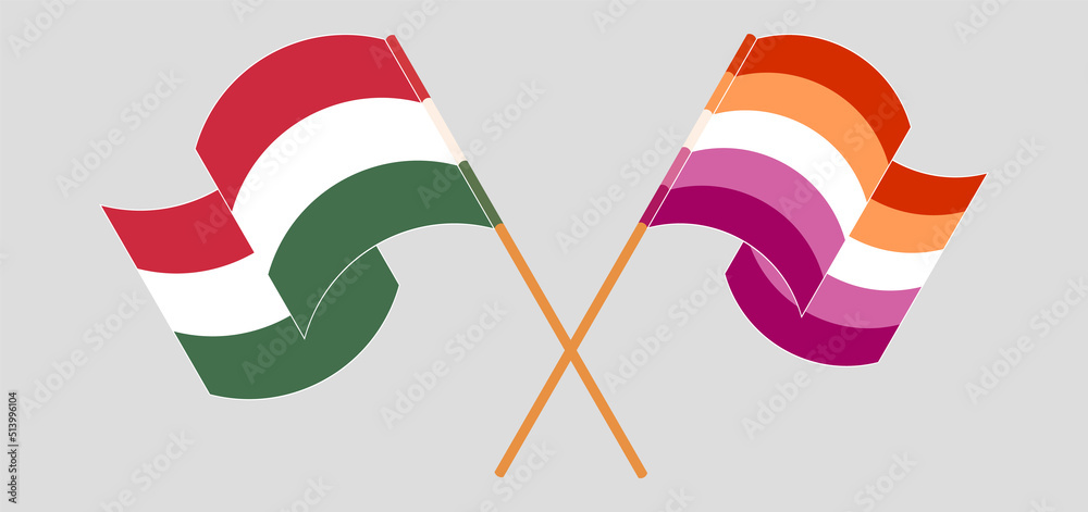 Crossed and waving flags of Hungary and Lesbian Pride
