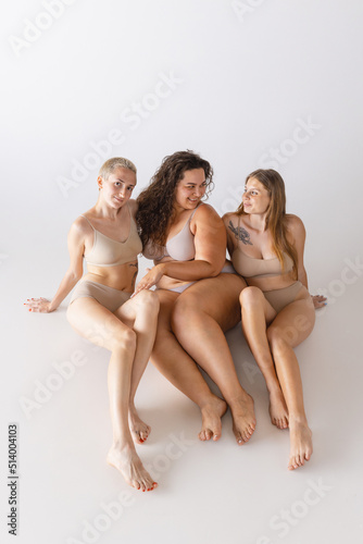 Wallpaper Mural Group portrait of beautiful women posing in underwear isolated over grey studio background. Sensuality, self-love Torontodigital.ca