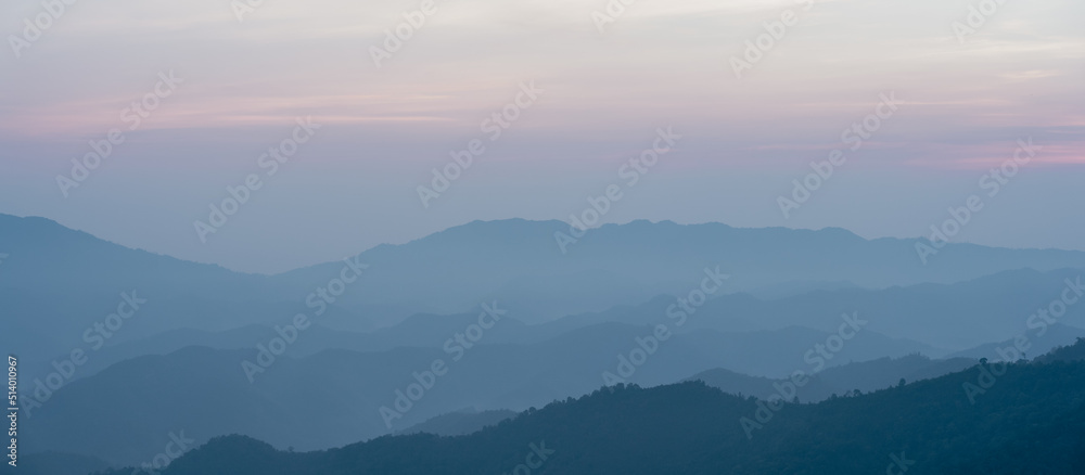 panorama view  layer of mountain with sunrise background