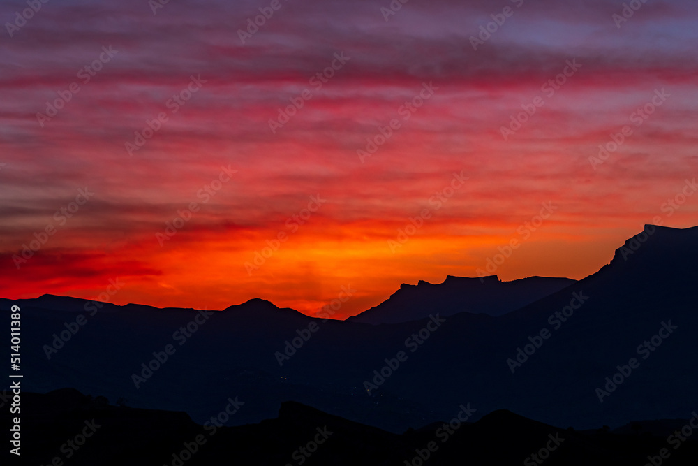 sunset in the mountains, evening landscape with bright sky