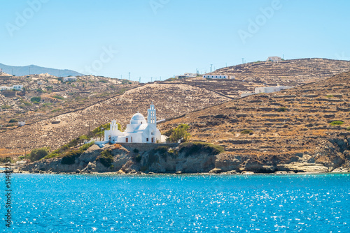 Fototapeta Naklejka Na Ścianę i Meble -  White church on a cliff over the Aegean Sea in Sikinos Island,  Greece