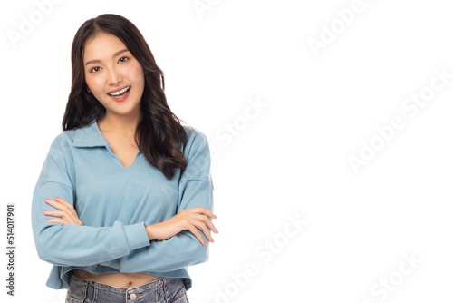 Portrait smiling young asian woman with crossed arms Happy asia girl posing with crossed arms and looking at camera isolated on white background copy space Confident female get happy and feel relax