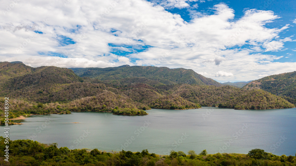 Lake among the mountains covered with tropical forest. Randenigala reservoir, Sri Lanka.