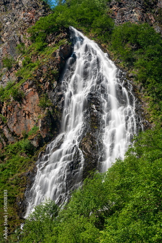 Horsetail Falls cascade down the cliffs of Keystone Canyon outside Valdez in Alaska