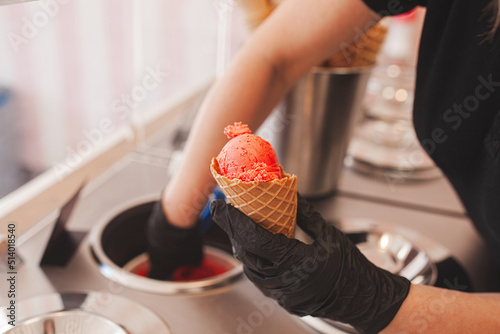Process of making ice cream. Professional ice cream dessert making in cafeteria. Ice cream equipment.