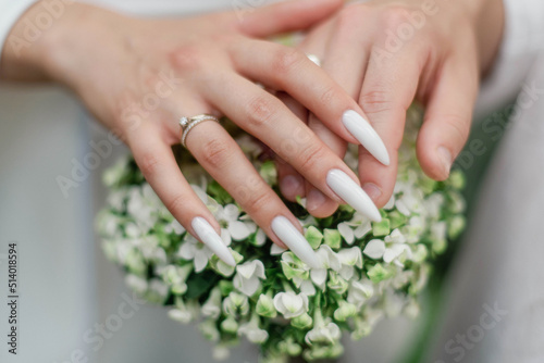 Hands. The bride and groom stand or go together in life. excitement before the wedding ceremony. family support.
