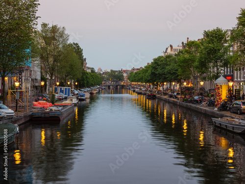 Sunset in Amsterdam at the river and bridge © Mustafa Kurnaz