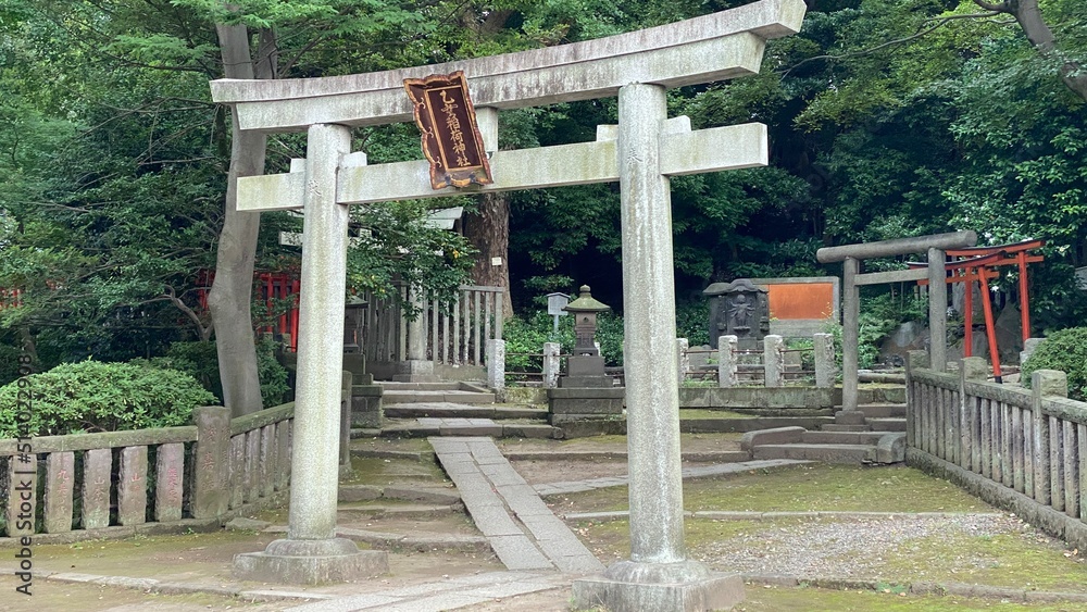 The stone tori gate of Japanese Shinto shrine, honorable landmark built by the 5th shogunate of Edo period “Tokugawa”, beside the main pagoda the hill is enshrined with various enlightenments. 2022/6 The stone tori gate of Japanese Shinto shrine, honorable landmark built by the 5th shogunate of Edo period “Tokugawa”, beside the main pagoda the hill is enshrined with various enlightenments. 2022/6