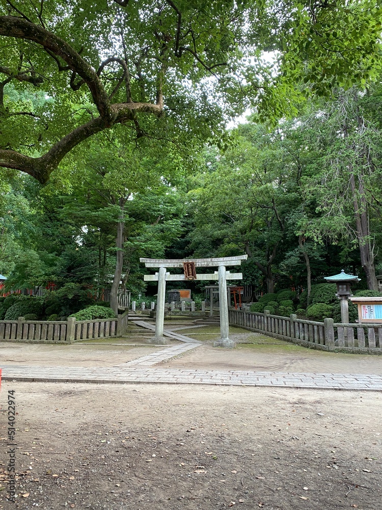 The stone tori gate of Japanese Shinto shrine, honorable landmark built by the 5th shogunate of Edo period “Tokugawa”, beside the main pagoda the hill is enshrined with various enlightenments. 2022/6 The stone tori gate of Japanese Shinto shrine, honorable landmark built by the 5th shogunate of Edo period “Tokugawa”, beside the main pagoda the hill is enshrined with various enlightenments. 2022/6