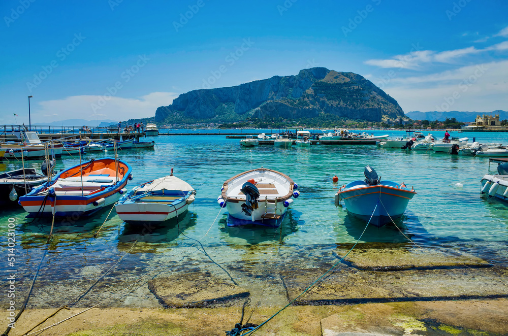 Palermo, Sicily - July 29, 2016: Small port with fishing boats in the center of Mondello