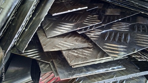 Scrap waste from aluminium plate resulting from the company's production activities. Accommodated and collected in containers