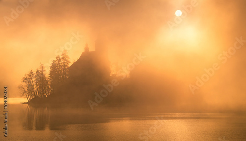 Fototapeta Naklejka Na Ścianę i Meble -  Beautiful autumn mist in the morning at Lake Bled.