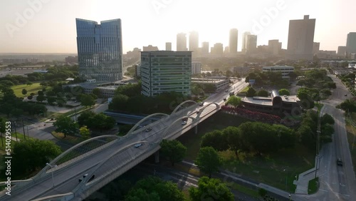 Dallas Fort Worth metro region. Ft Worth skyline. Aerial pullback reveal in magic light at Trinity River and Park. photo