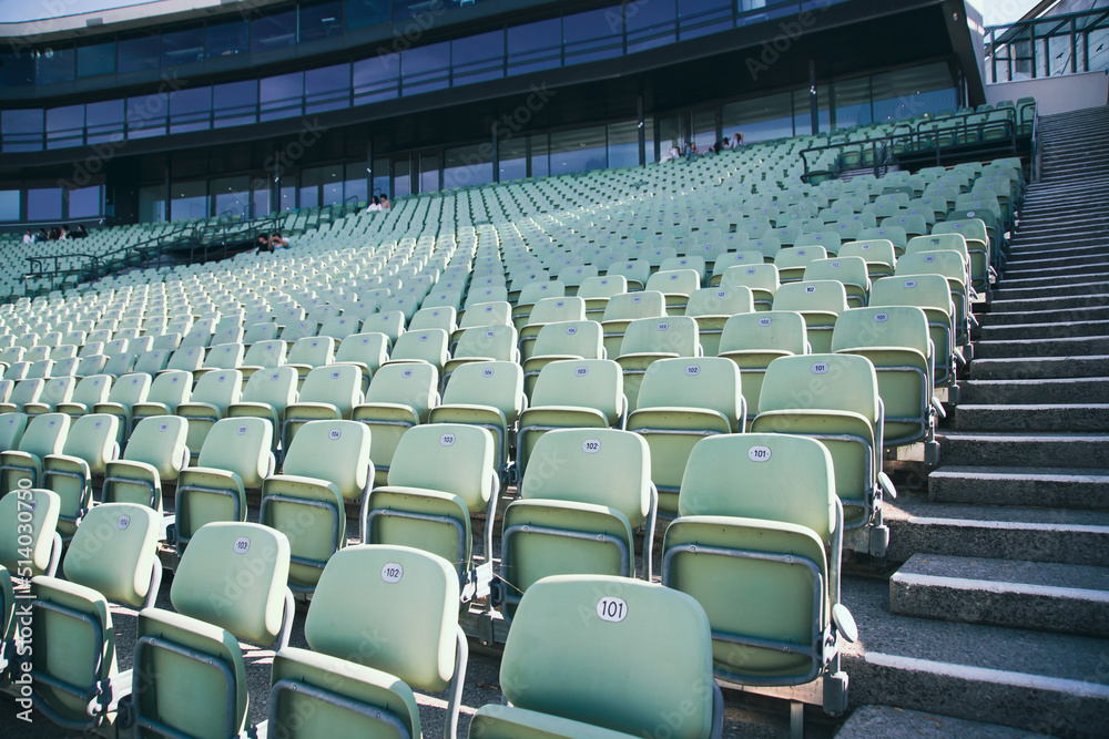 Naklejka premium Empty Plastic Chairs at the Stadium