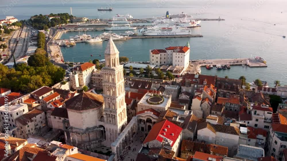 Aerial view of Bell Tower Of Catholic Cathedral Of Saint Domnius In Split, Croatia.Orbit panoramic view of Diocletian's palace view, Dalmatia, Croatia. Sunset in Split, footage high quality 4k.