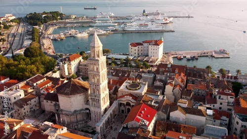 Aerial view of Bell Tower Of Catholic Cathedral Of Saint Domnius In Split, Croatia.Orbit panoramic view of Diocletian's palace view, Dalmatia, Croatia. Sunset in Split, footage high quality 4k. photo