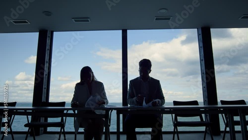 Wallpaper Mural Partners silhouettes signing contract at panorama window. Business team analyze Torontodigital.ca