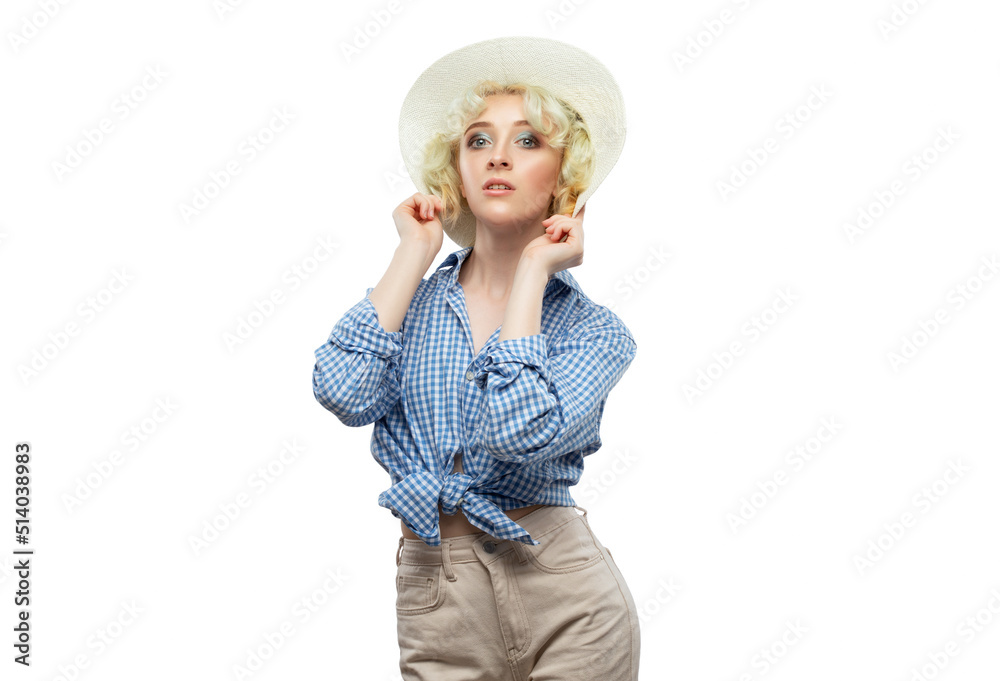 Portrait of attractive girl with healthy clean skin and beautiful make-up in a straw hat and a blue plaid shirt. Aesthetic cosmetology and makeup concept. Portrait of attractive girl with healthy clean skin and beautiful make-up in a straw hat and a blue plaid shirt. Aesthetic cosmetology and makeup concept.
