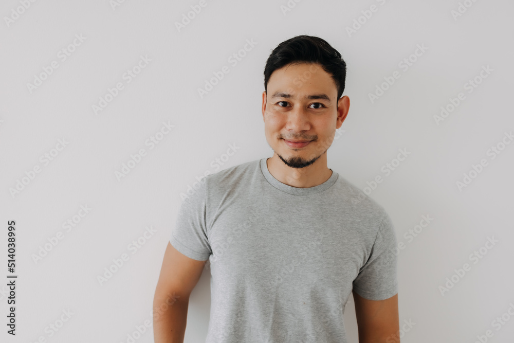 Obraz premium Happy asian man in his charm and relax pose for advertise.