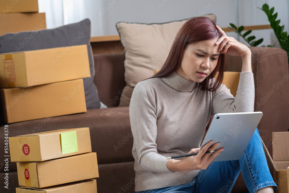 Young Asian SME businessman starting a small and boxed SME business as an online business. Online SME business concept. Young Asian SME businessman starting a small and boxed SME business as an online business. Online SME business concept.