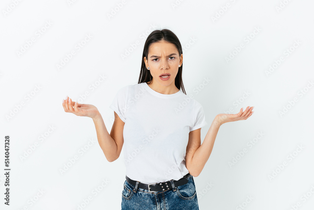 Portrait of irritated young brunette woman Portrait of irritated young brunette woman