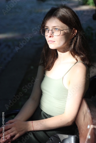 Sunny portrait of a blue-eyed girl