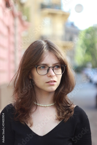 Portrait of a girl with glasses